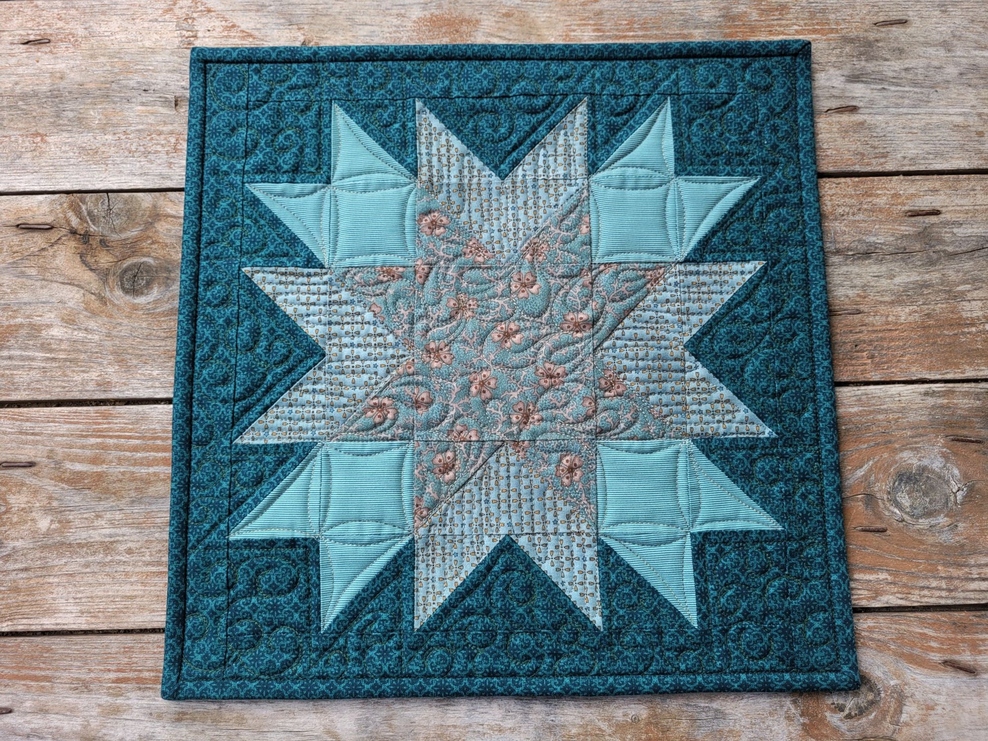 Teal star mini quilt