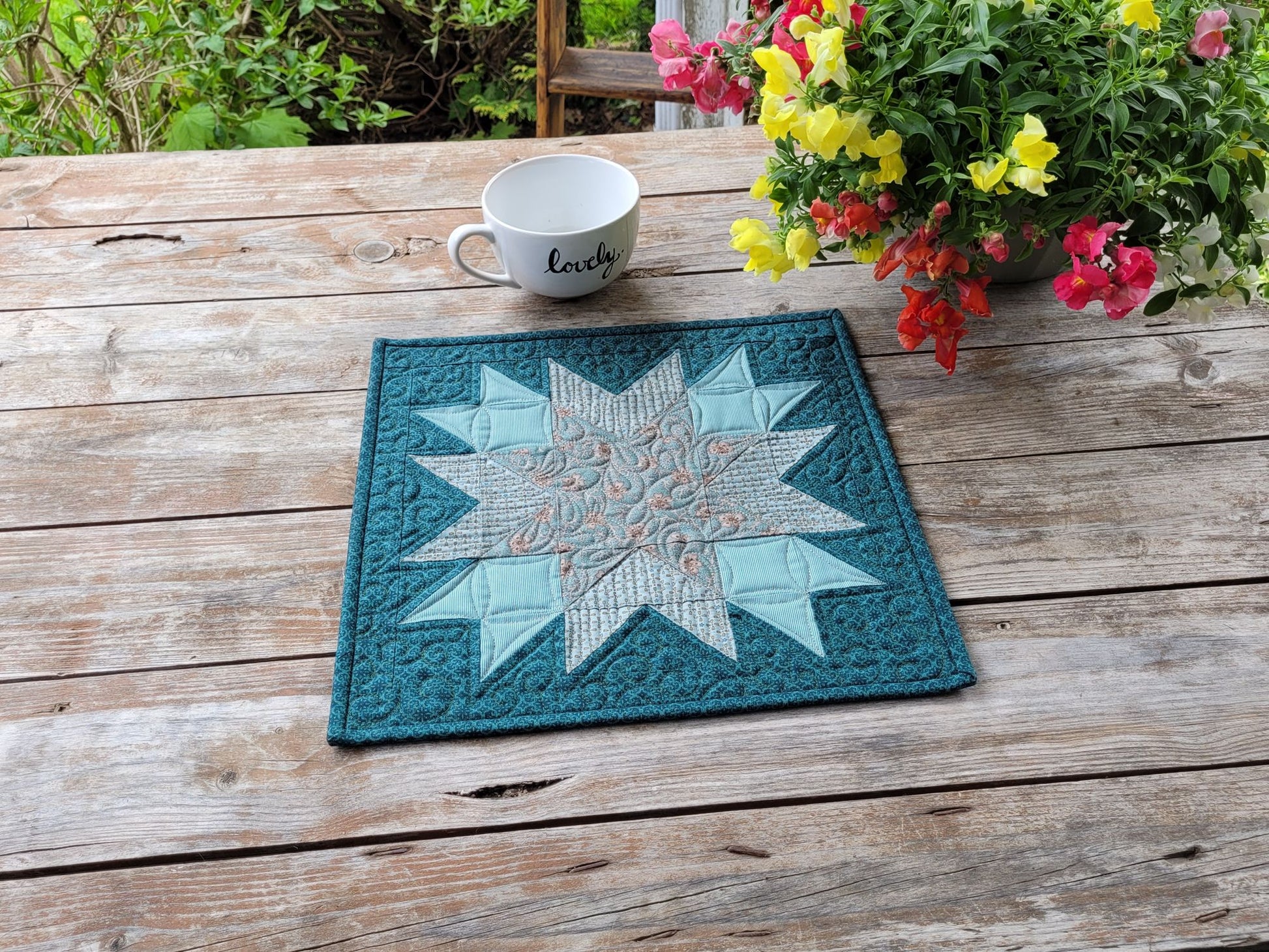 Teal star mini quilt