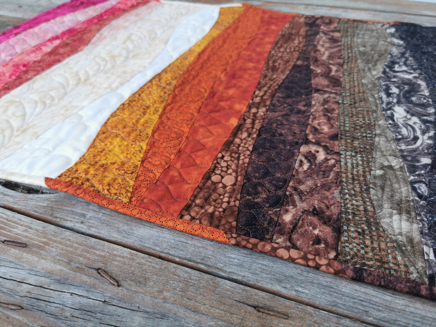side angle view of the minimalist landscape quilt.