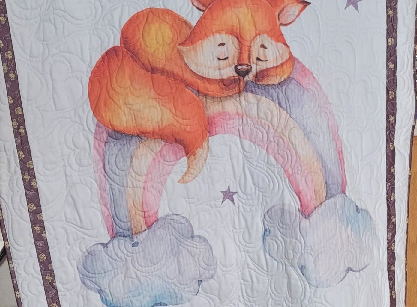 fox on rainbow crib quilt