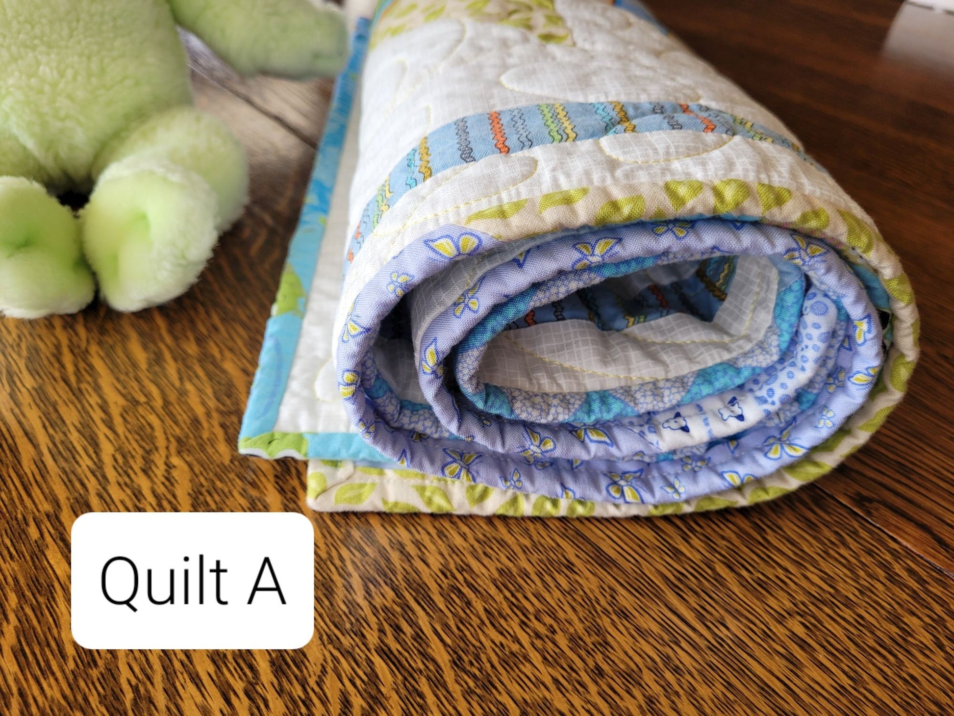 baby quilt with animal theme prints