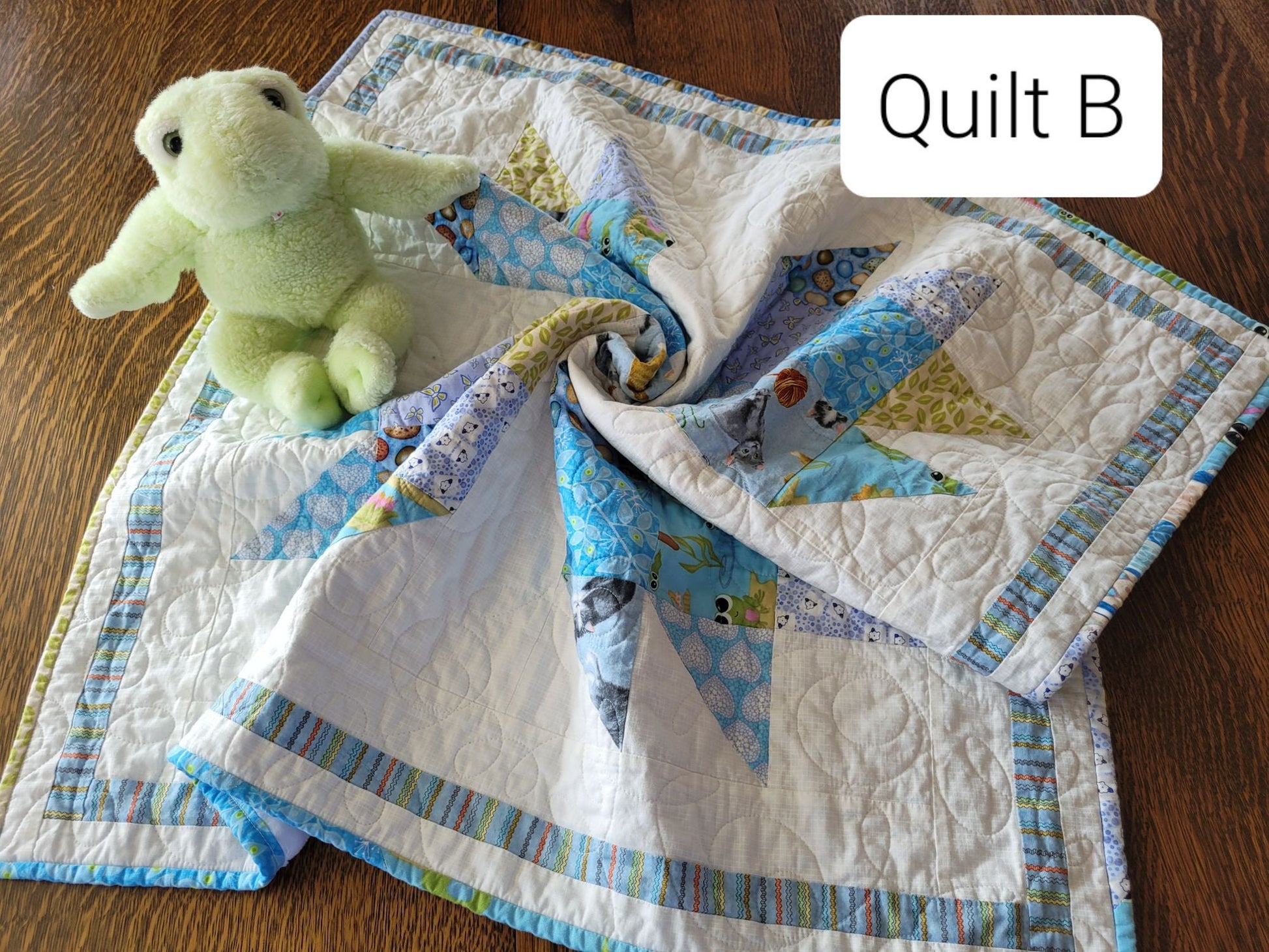 baby quilt with animal theme prints