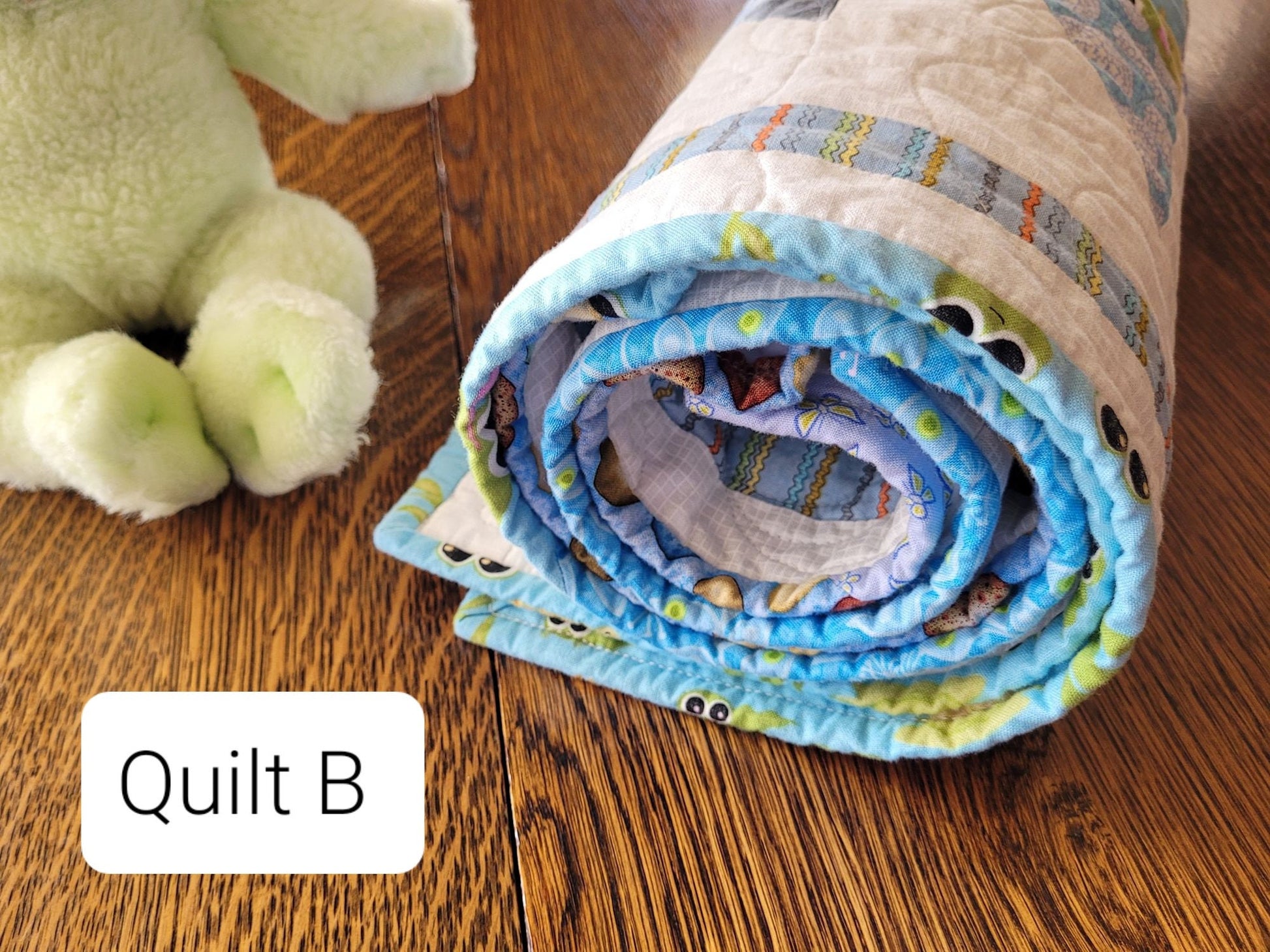 baby quilt with animal theme prints