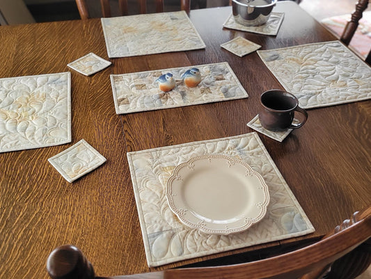 Neutral dining table placemat set shown on table