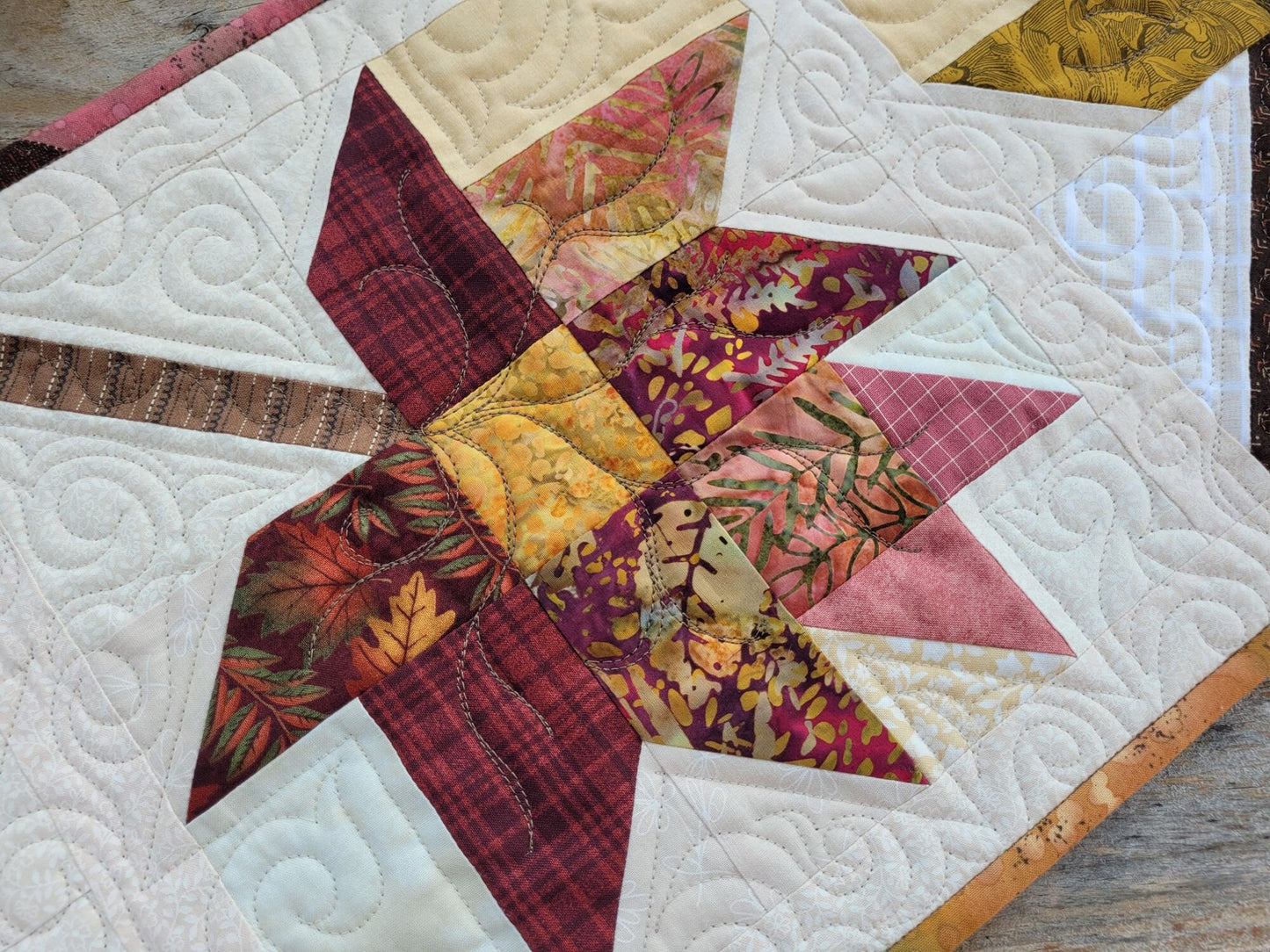 quilted table runner with fall leaves