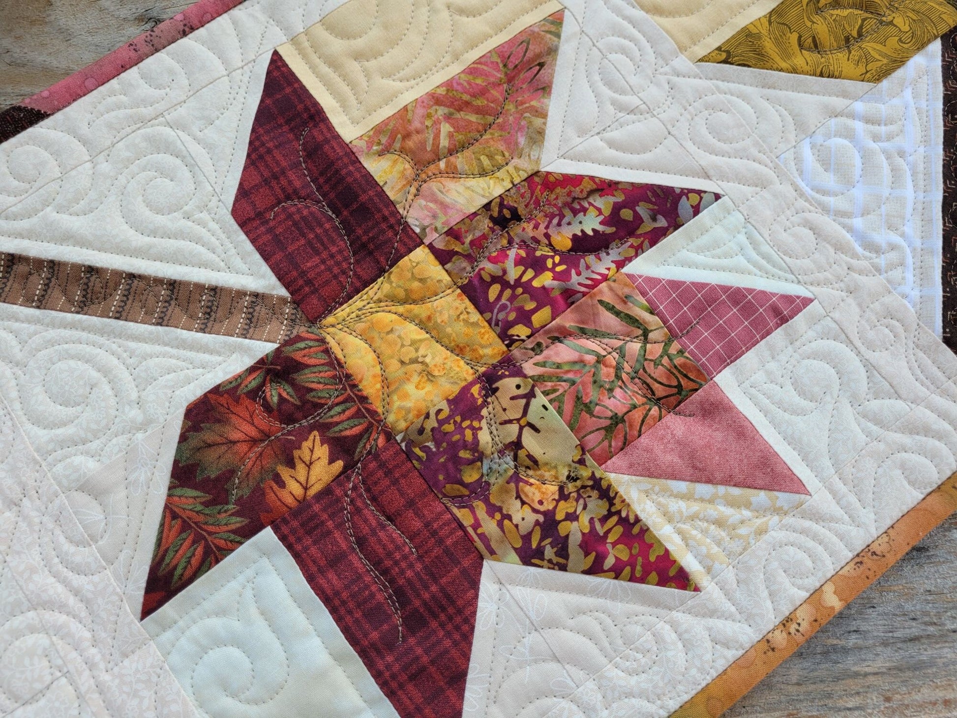 quilted table runner with fall leaves