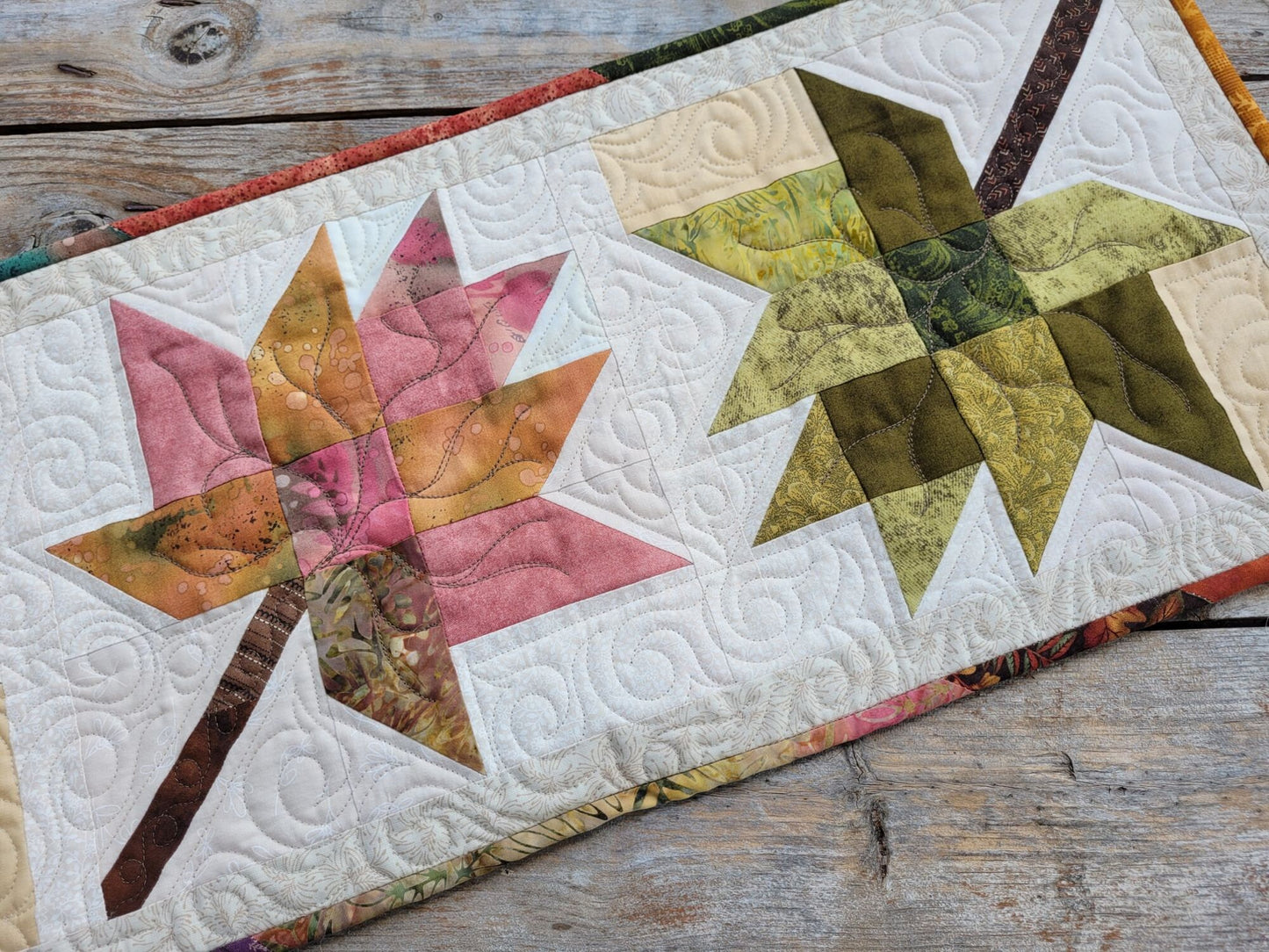 quilted table runner with fall leaves