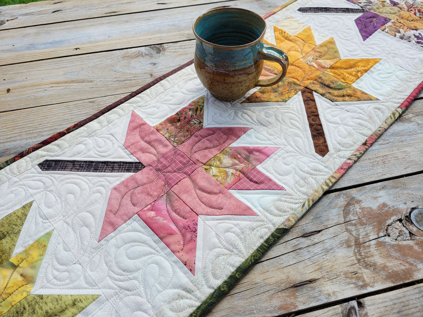 quilted table runner with fall leaves