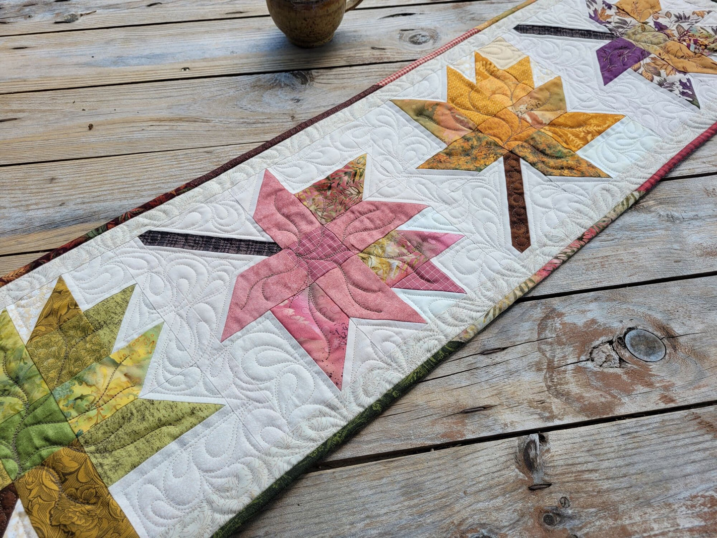 quilted table runner with fall leaves