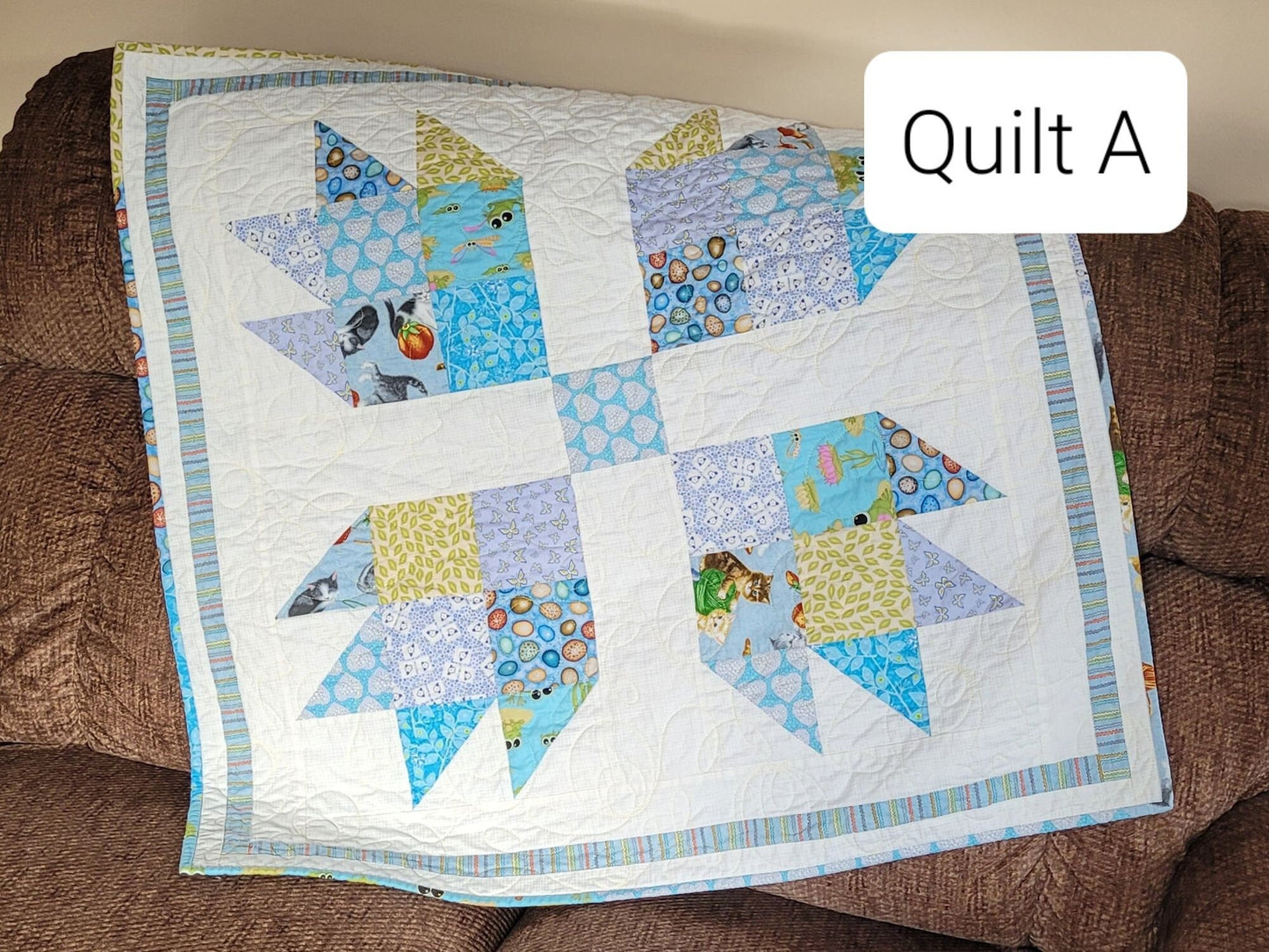 baby quilt with animal theme prints