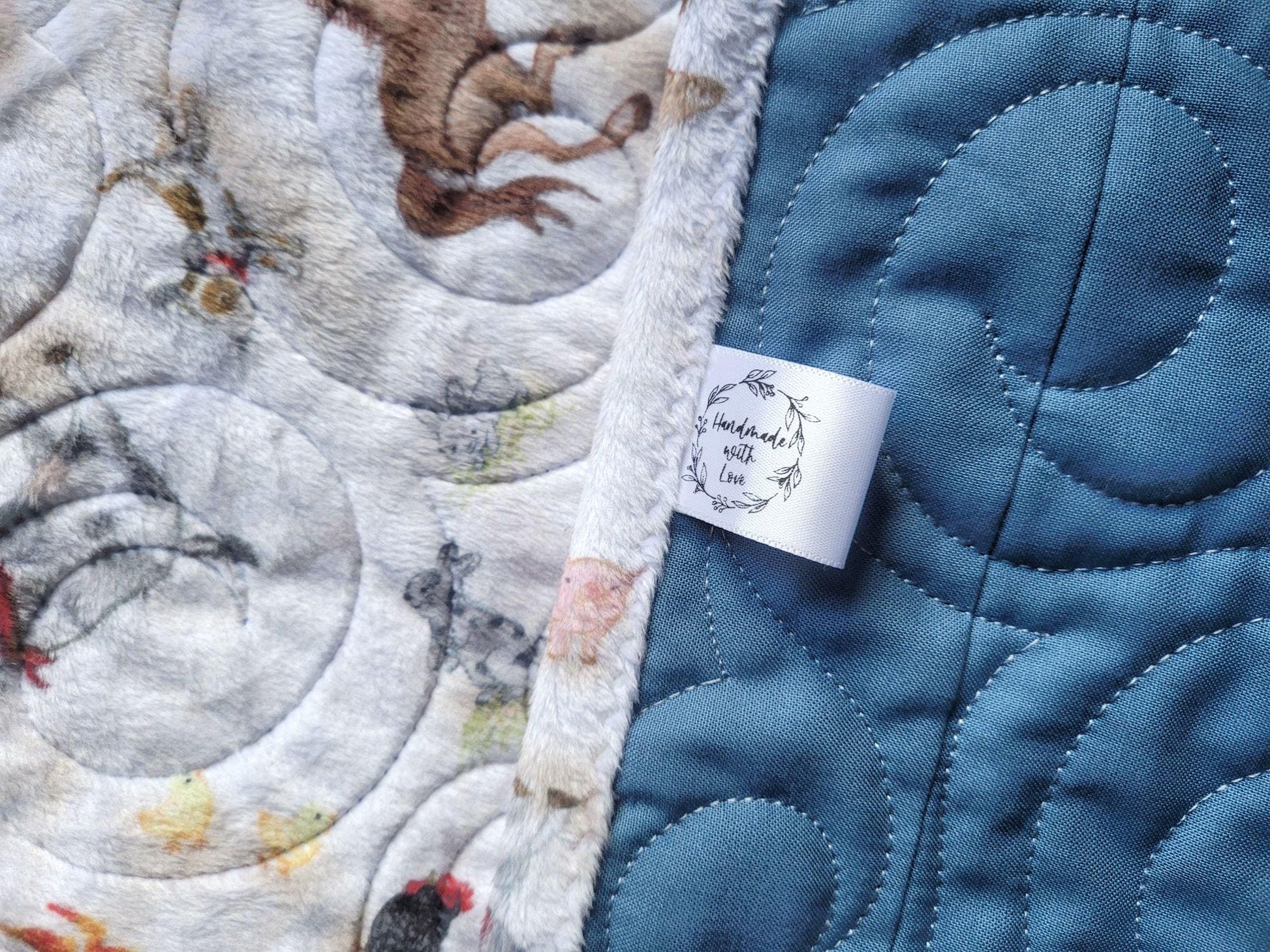 handmade label and soft minky backing of baby quilt