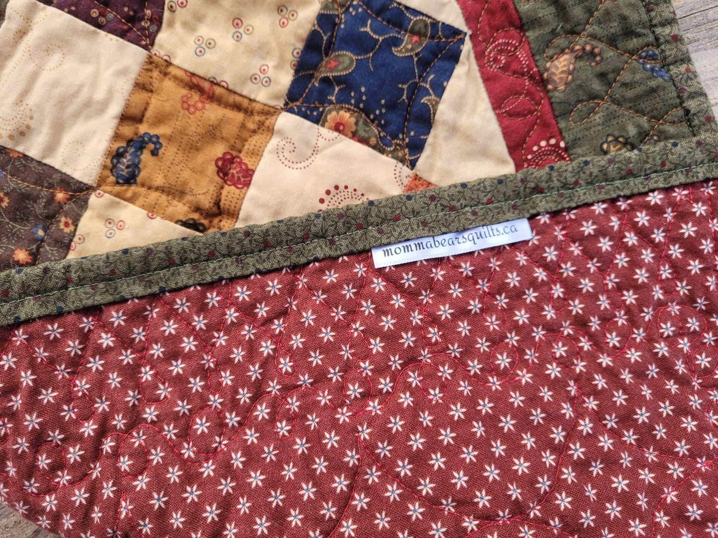 showing back of quilted table runner