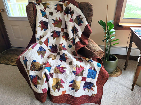 Quilted Throw Blanket in Scrappy Bear Paw Patchwork with Soft Backing