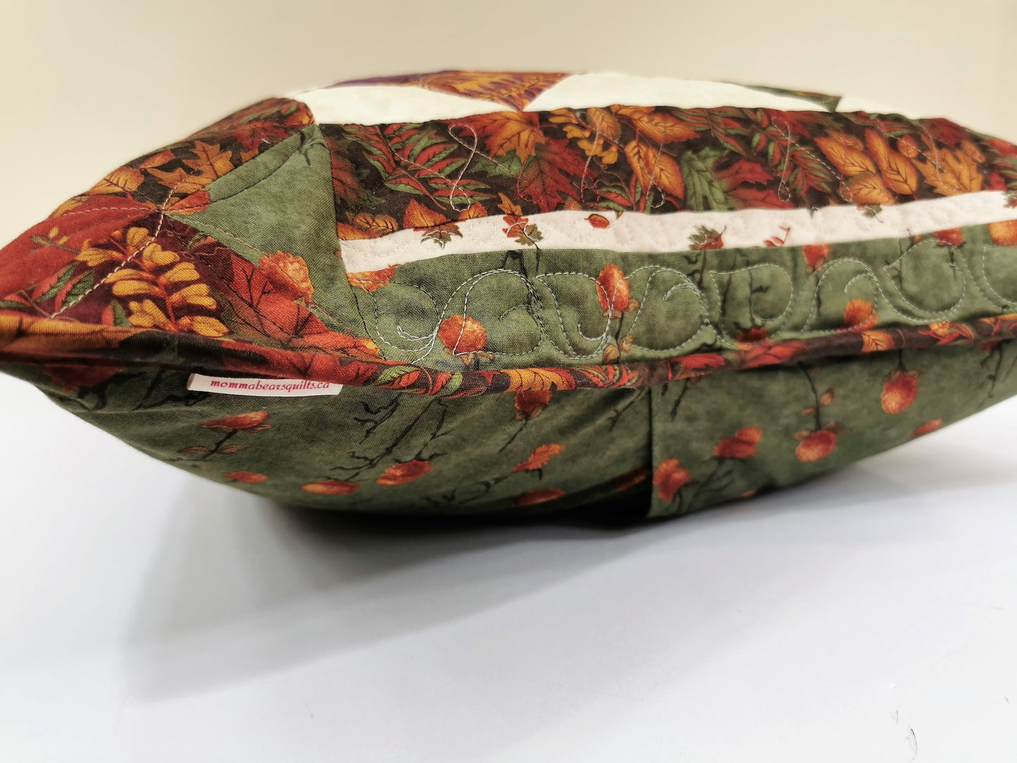 side view of pillow laying on table