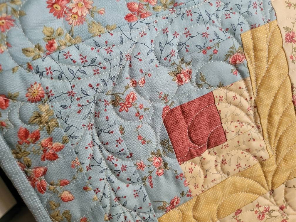 teal and golden yellow table runner