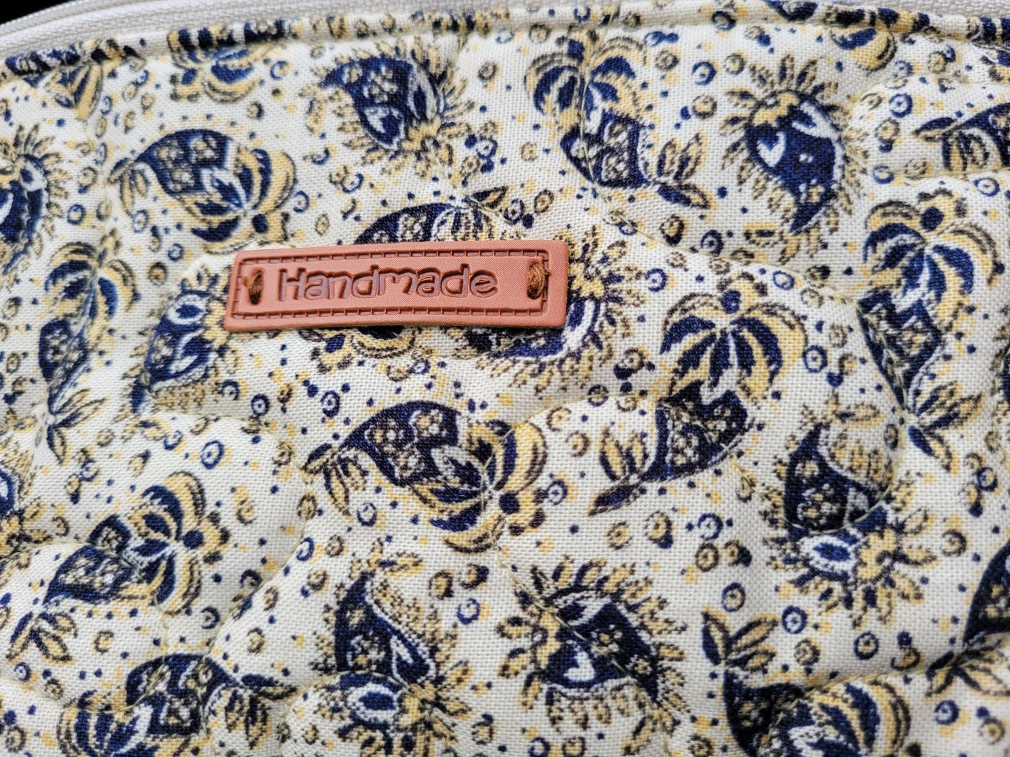 close up of cotton fabric on quilted bag