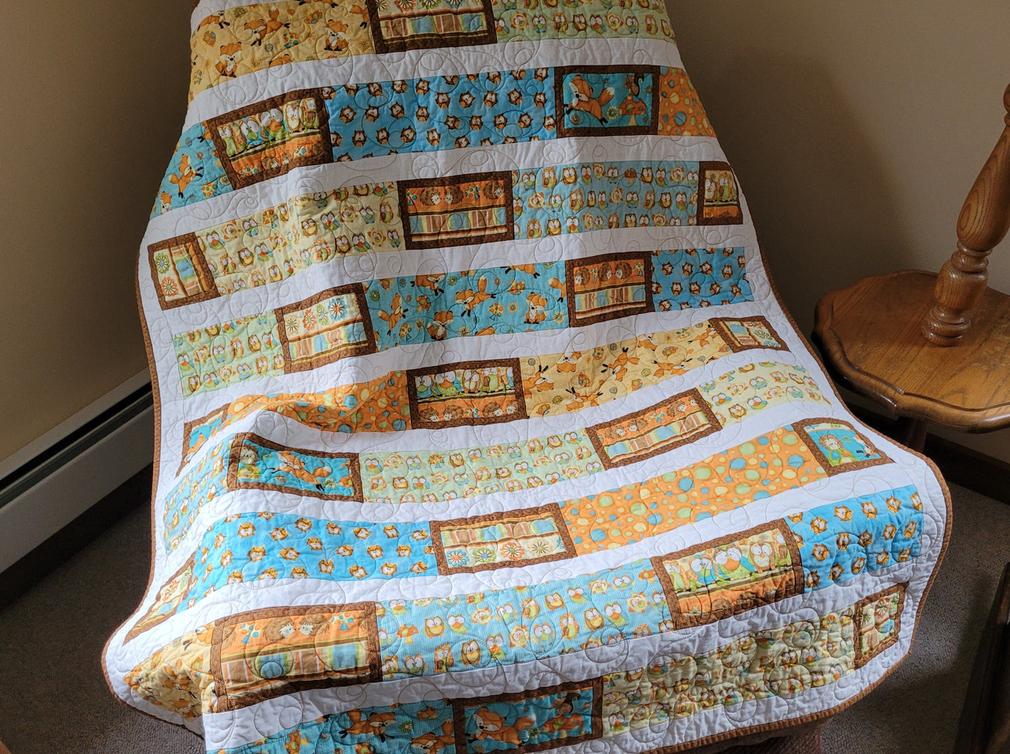 toddler quilt with forest animals