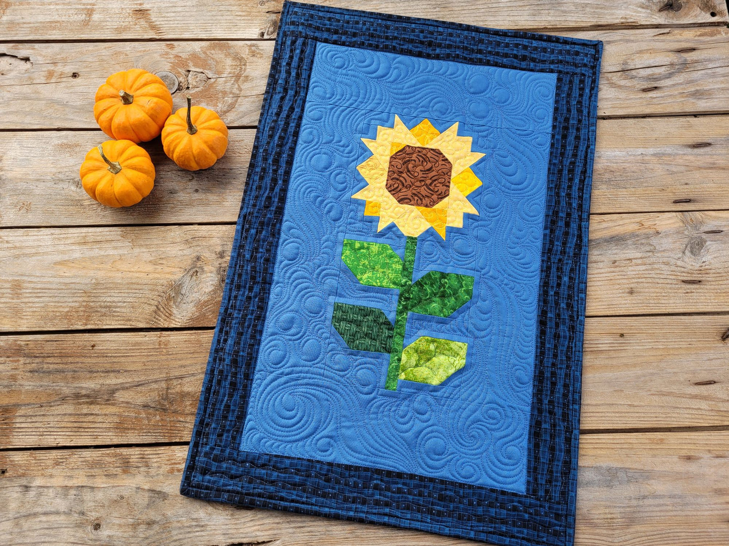 Quilted sunflower patchwork wall hanging