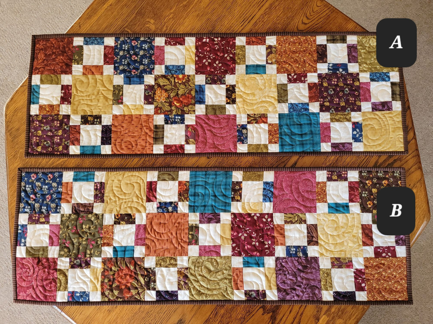 Two patchwork table runners on a wooden surface with labels A and B.