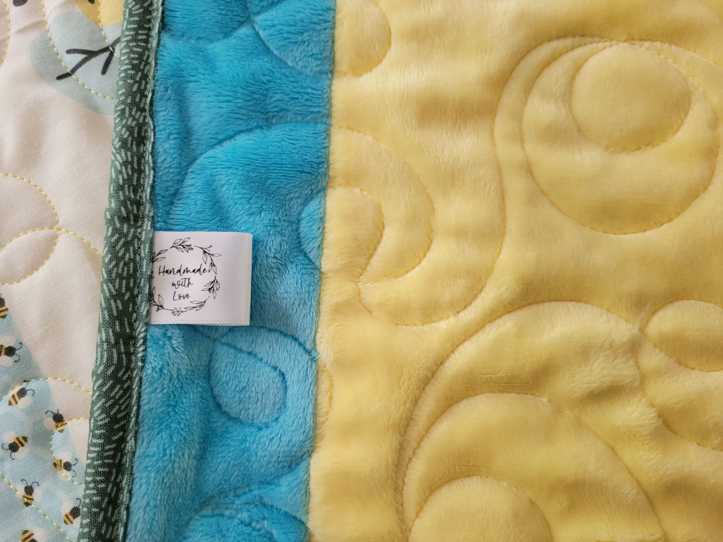 Close up of the soft minky back and the Handmade with Love label.