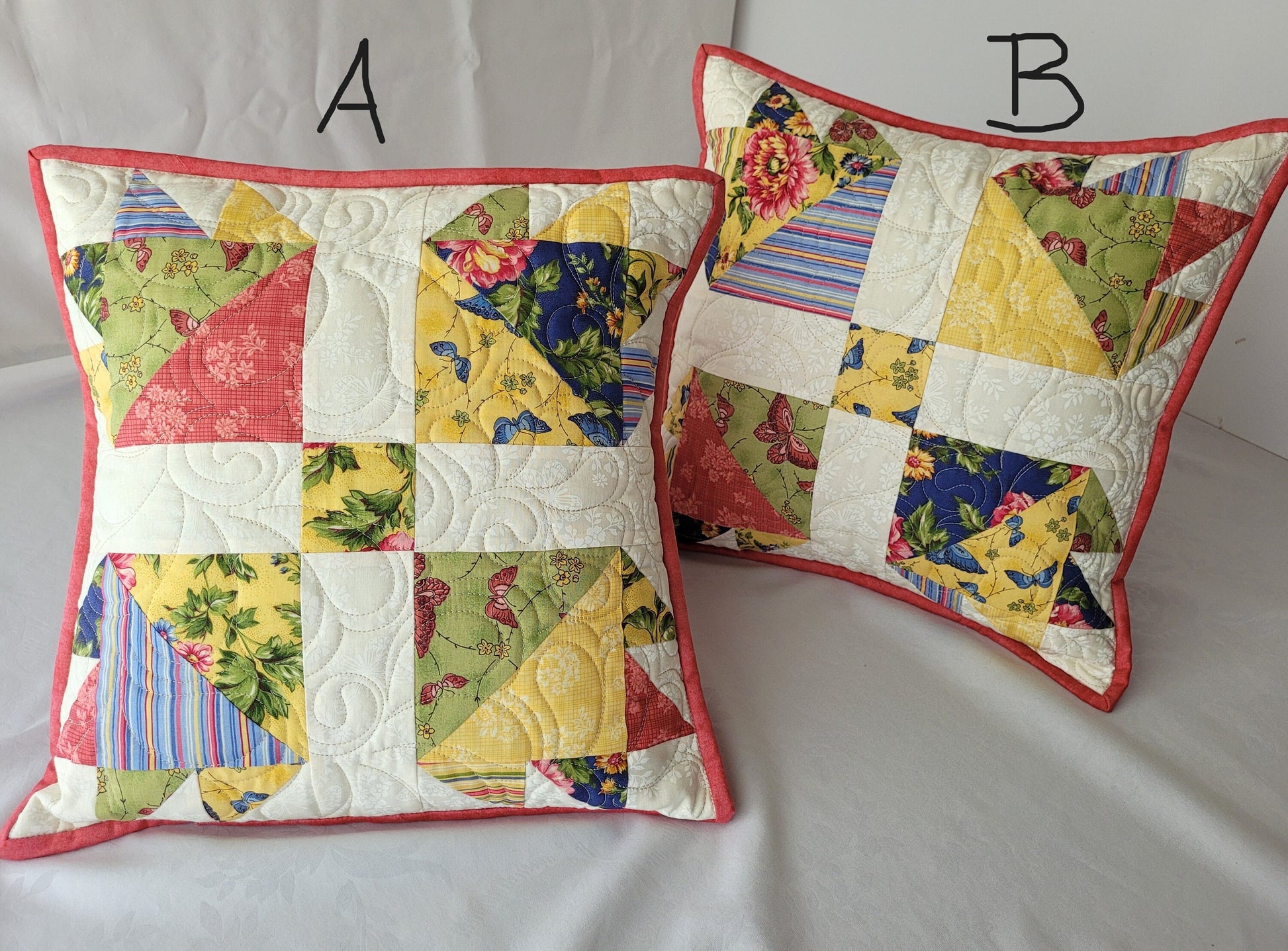 two coordinating bear paw pillows