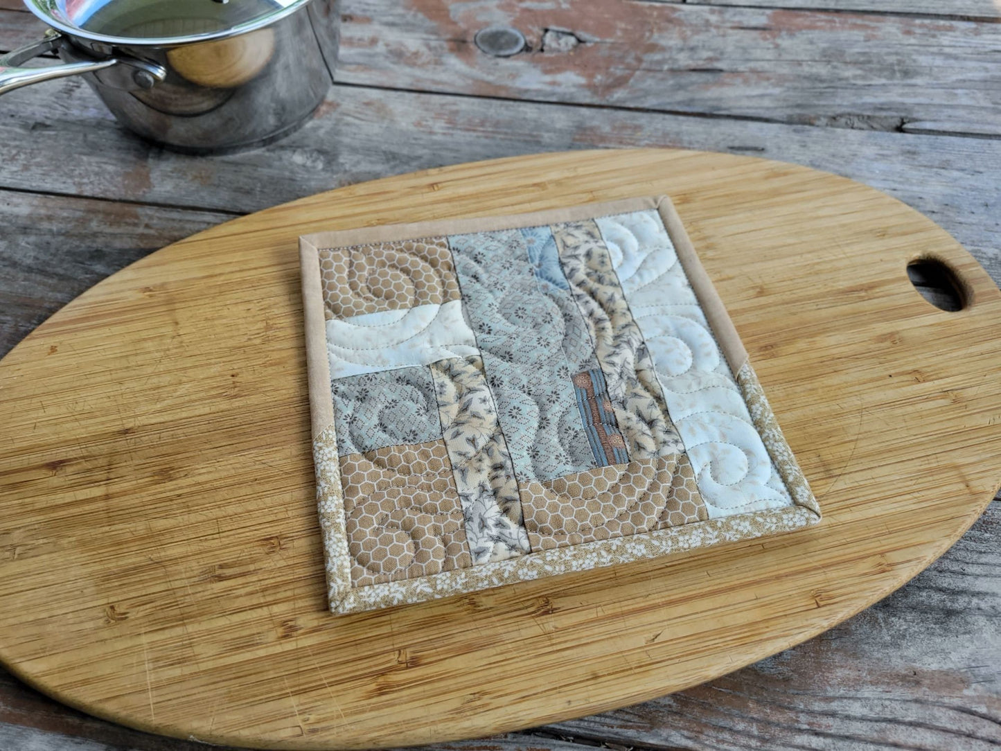 neutral patchwork pot holder