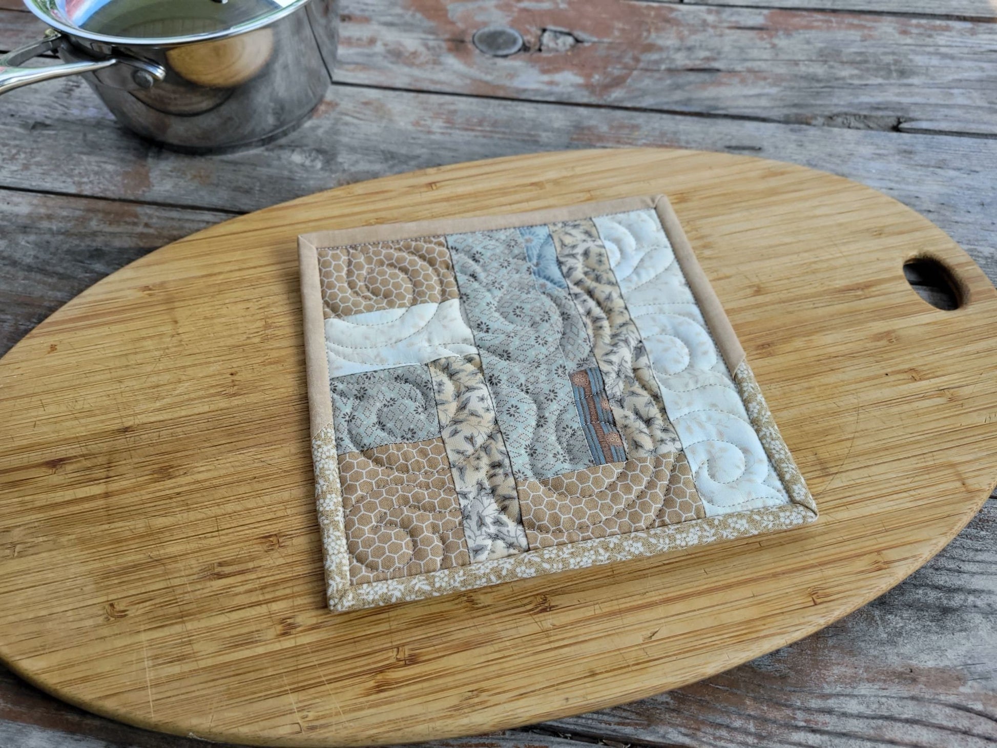 neutral patchwork pot holder