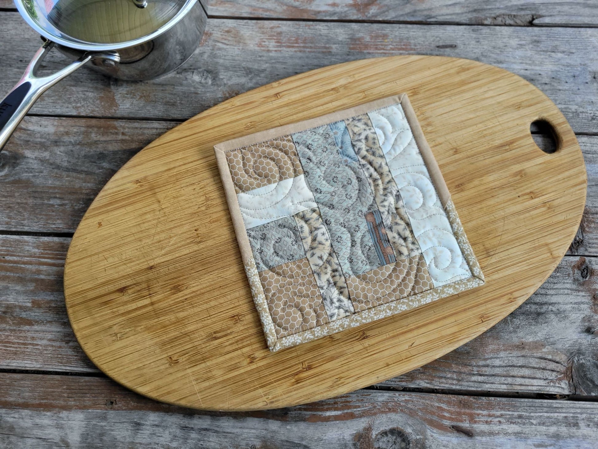 neutral beige quilted potholder