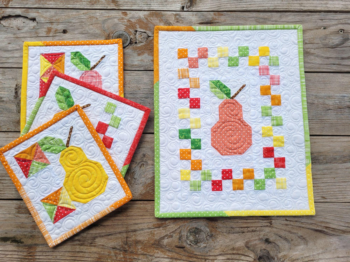 mini wall quilts in colorful scrappy patchwork pear fruit