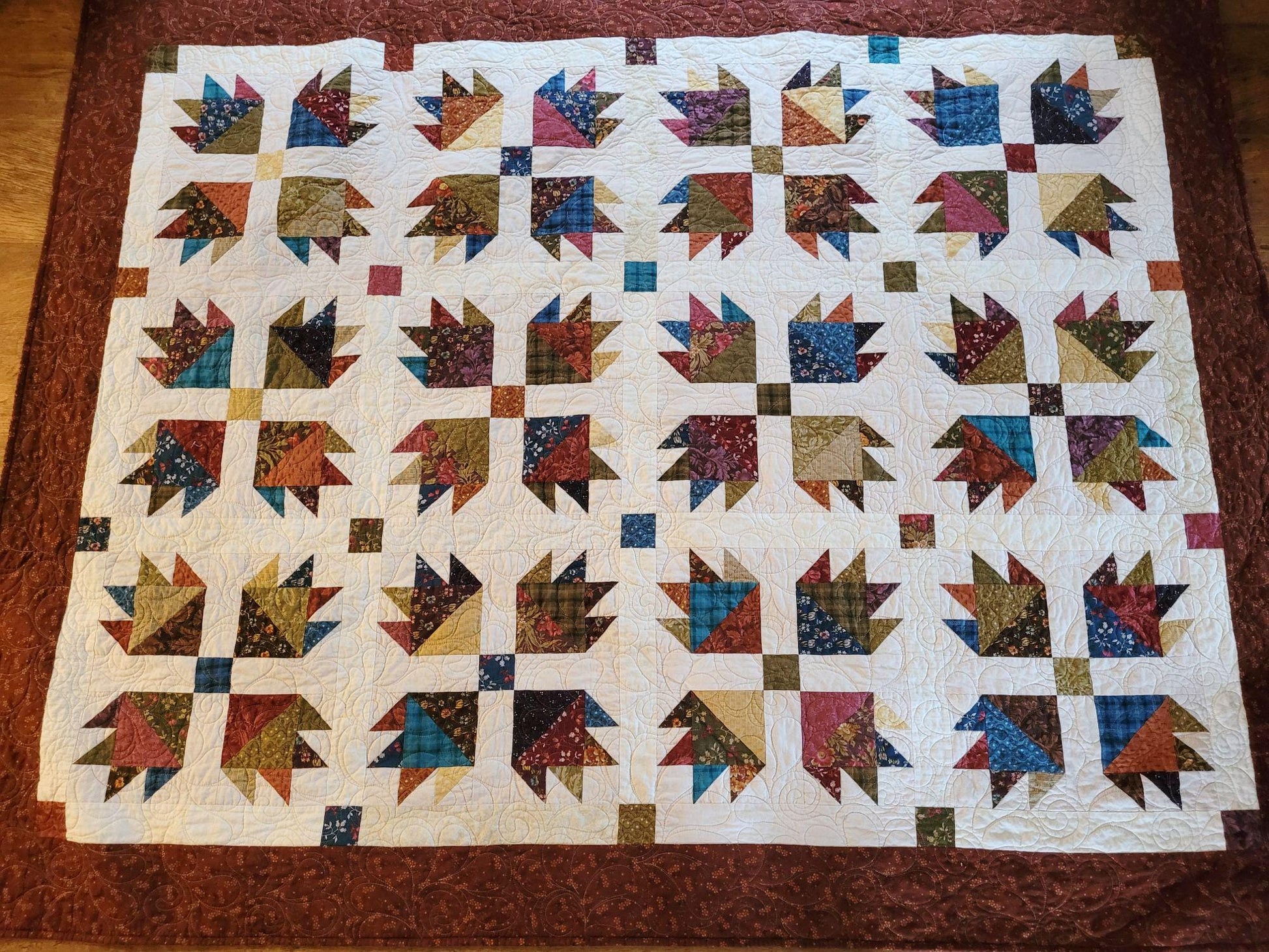 Quilted Throw Blanket in Scrappy Bear Paw Patchwork with Soft Backing