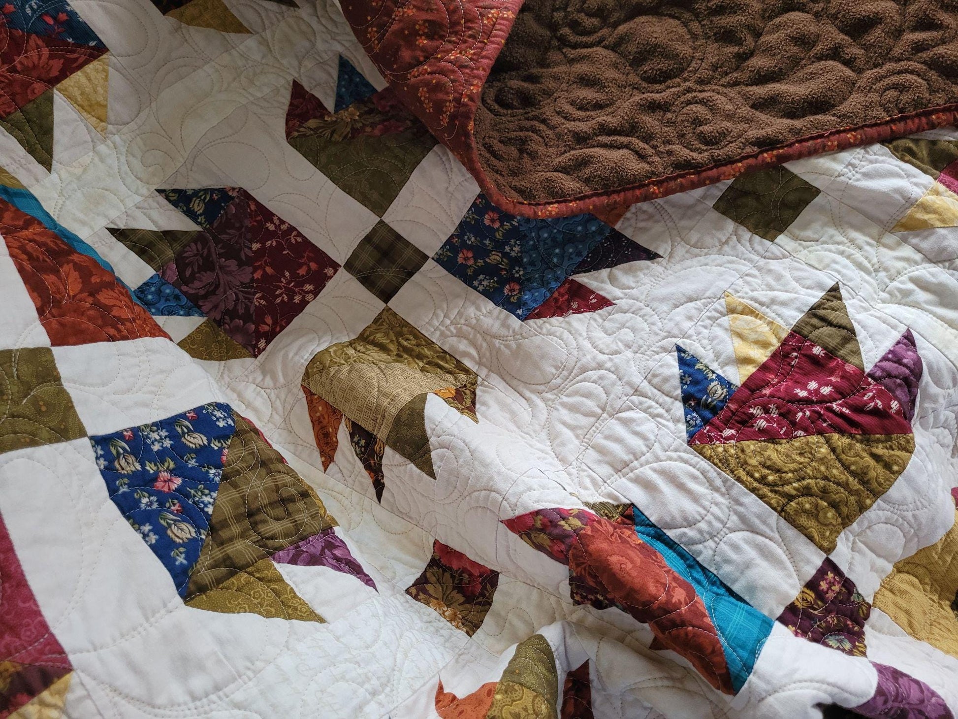 Quilted Throw Blanket in Scrappy Bear Paw Patchwork with Soft Backing