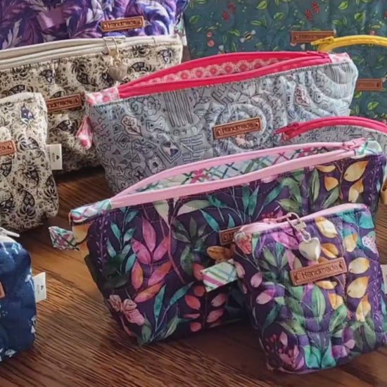 handmade quilted zipper pouches in fun cotton fabrics, made in small batches