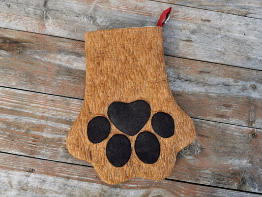 pet paw stocking, brown with fur like quilting and black toes. 