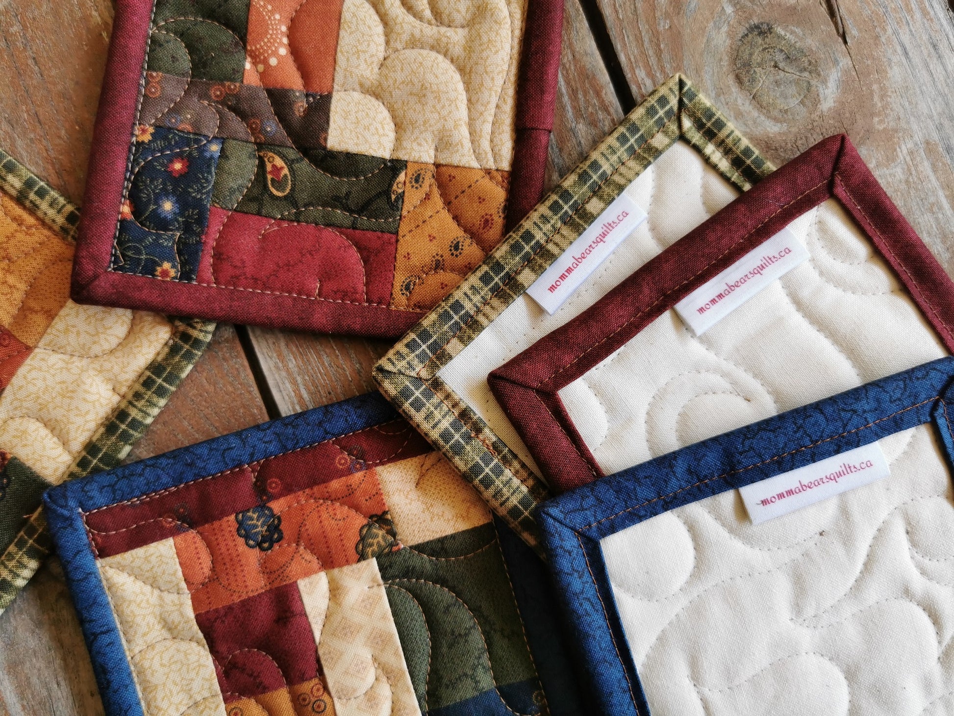 this close up shows a sample of the back of the quilted coasters and the three different bindings used. 