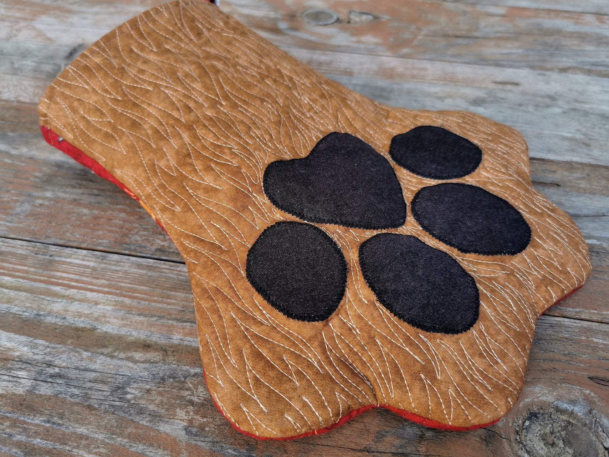 angle view of pet stocking showing quilting detail