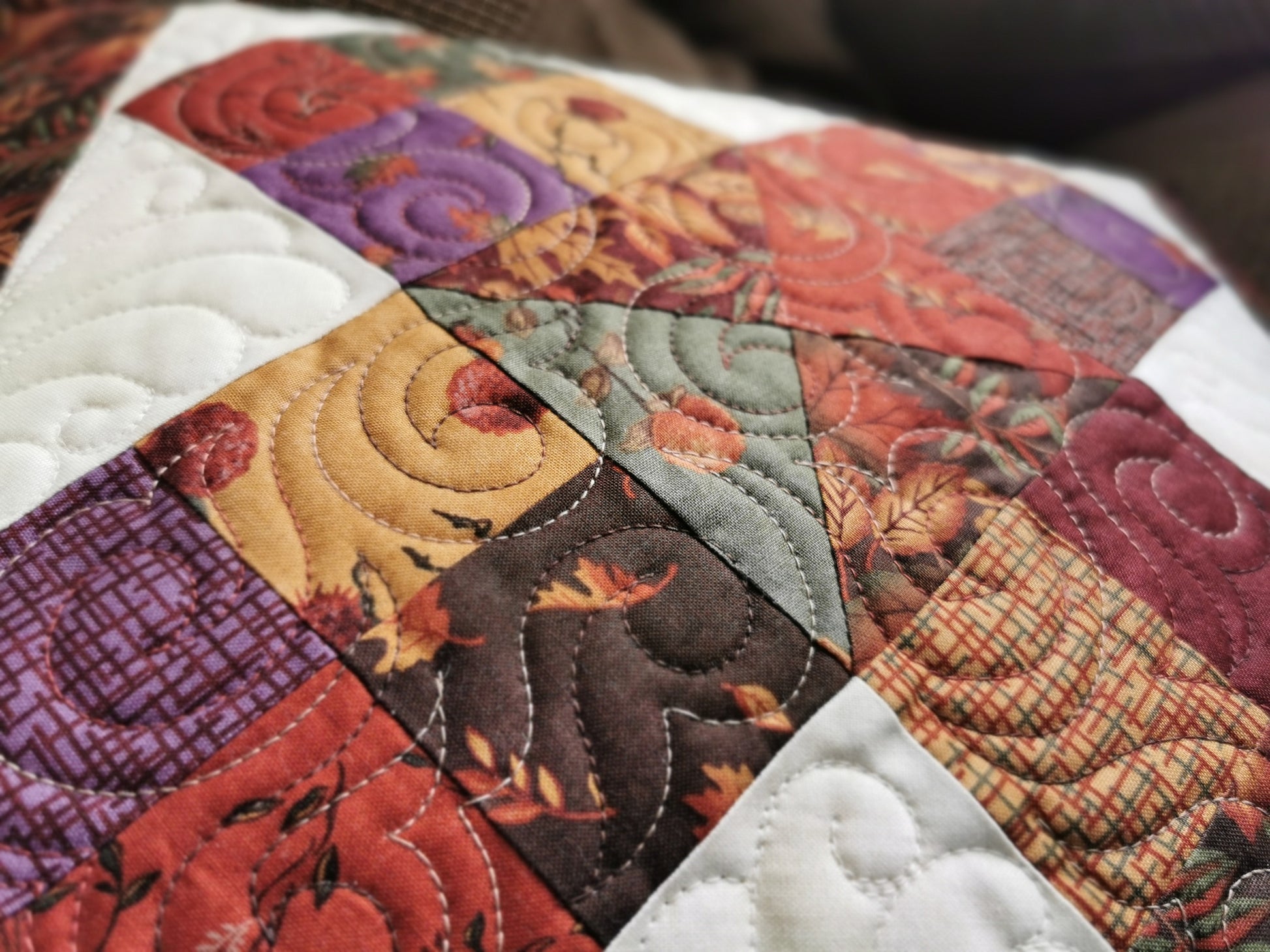 close up side view in lighting that shows how the quilting makes texture