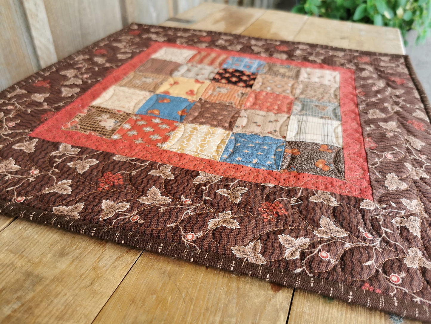 side view of quilt showing close up of border fabric in foreground