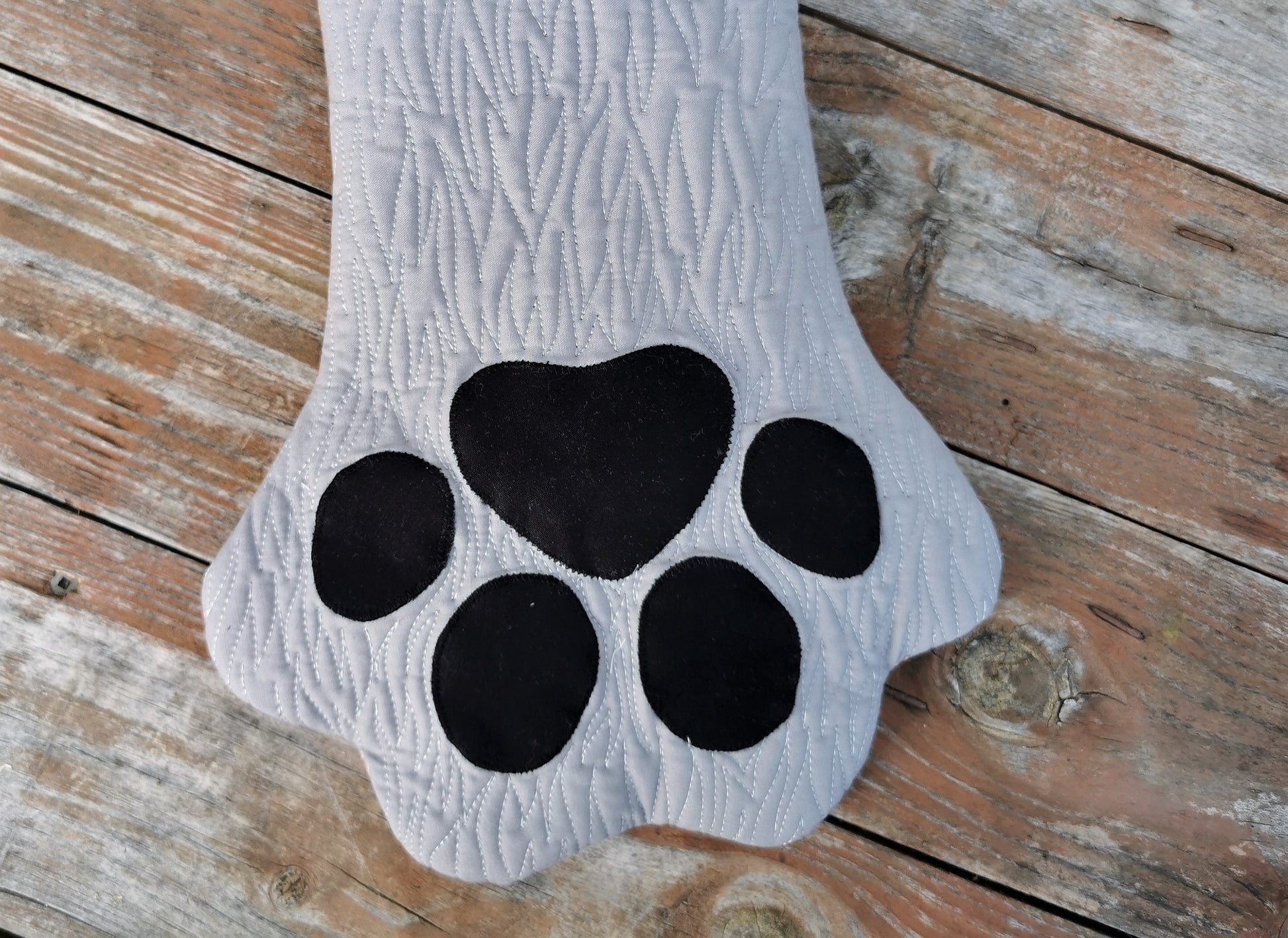 close up of paw stocking with black toes