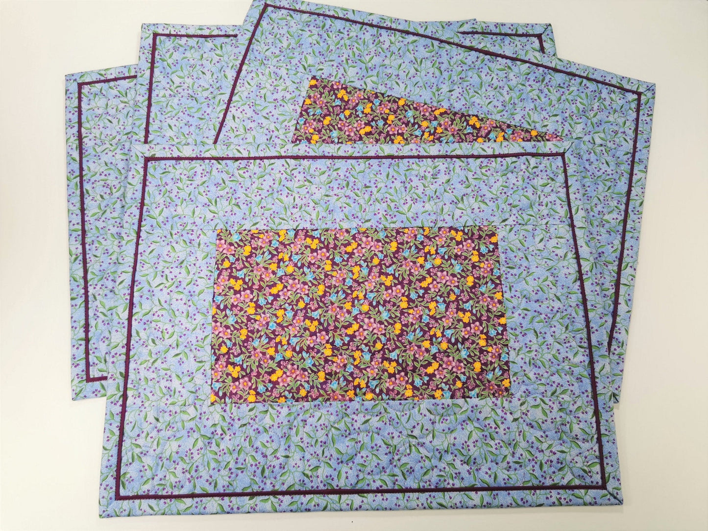 Four Blue Floral Quilted Placemats