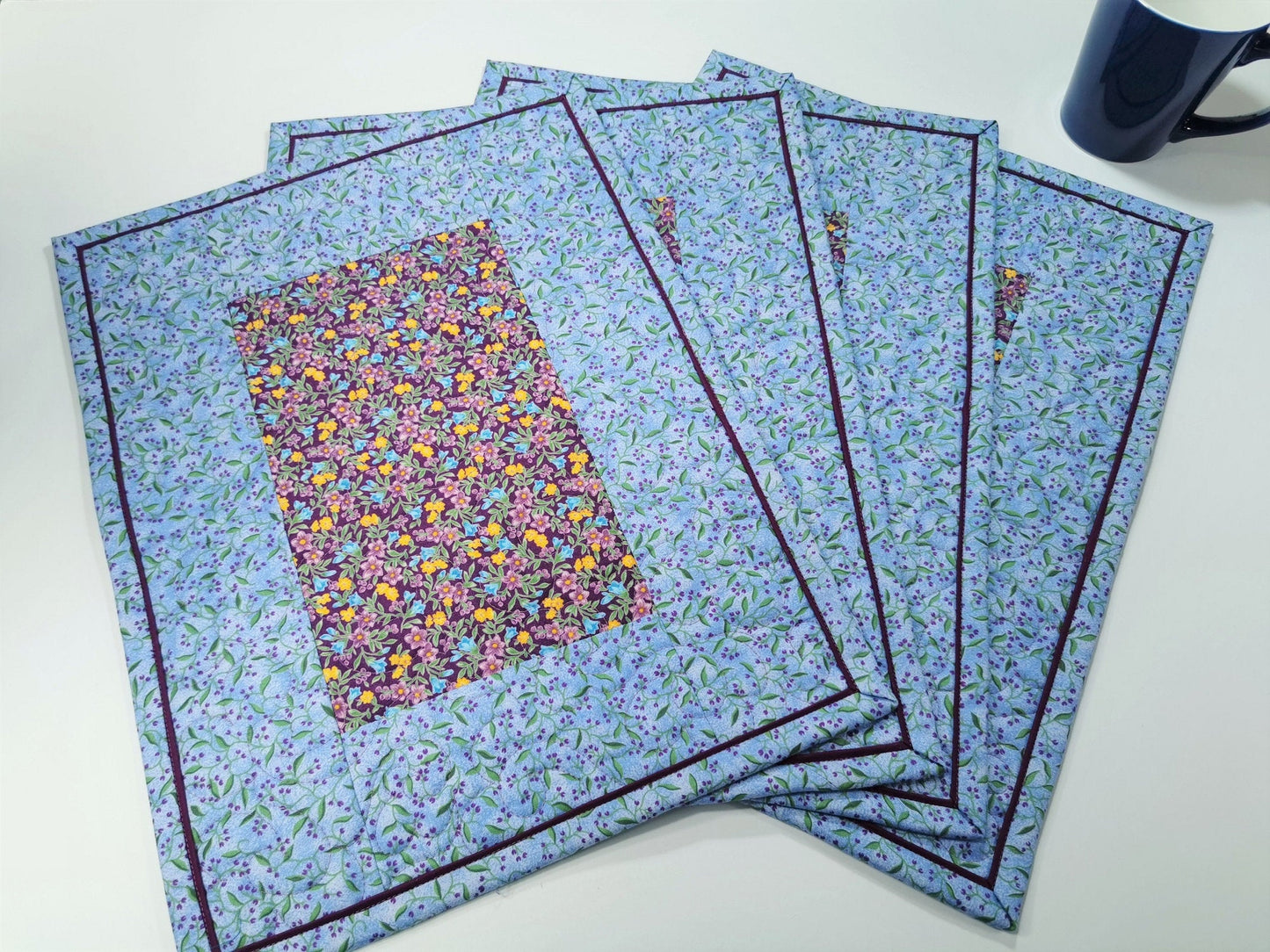 Four Blue Floral Quilted Placemats