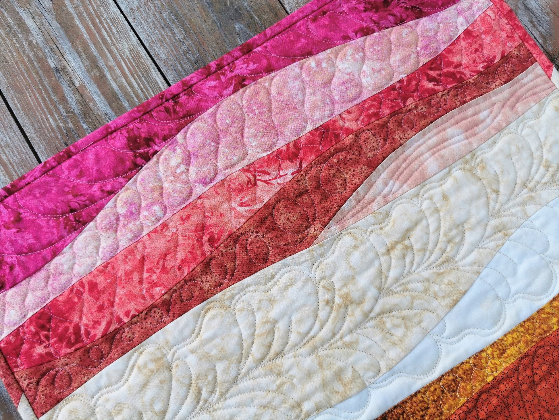 modern table runner close up view showing fancy stitching