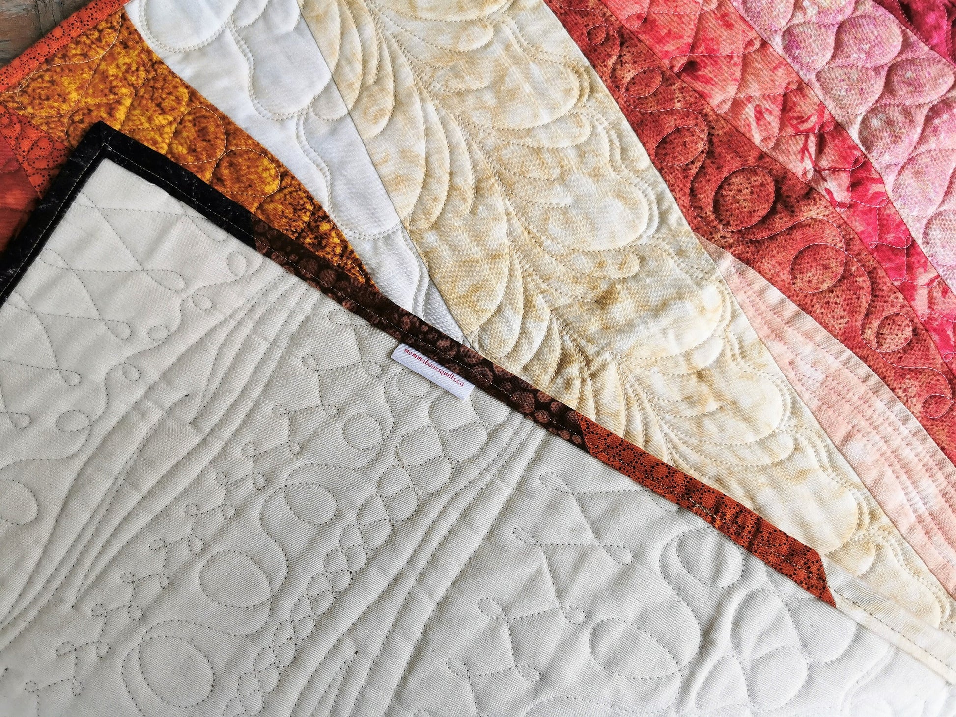 minimalist quilt close up view showing back