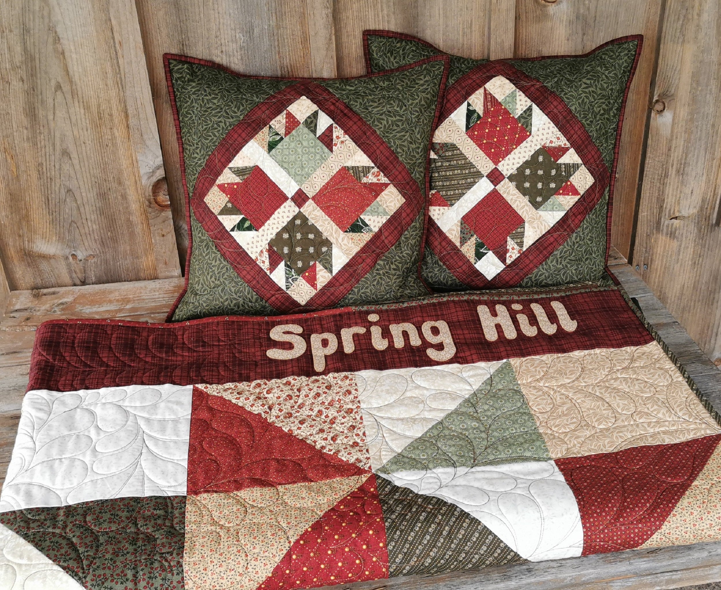 Throw quilt with matching pillows