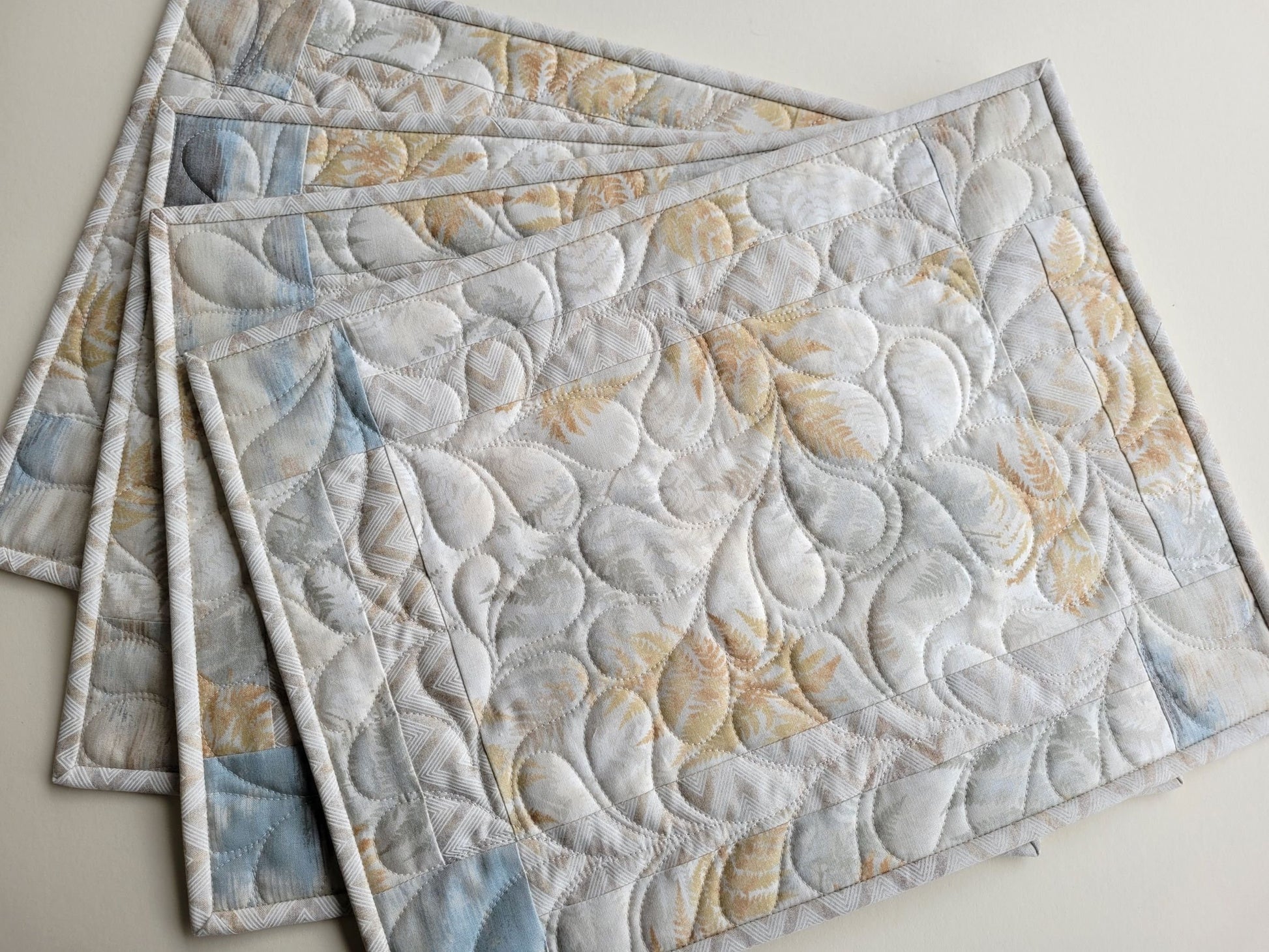 Neutral Quilted Placemats in Slate Blue, Beige and Gray with Modern Abstract Ferns