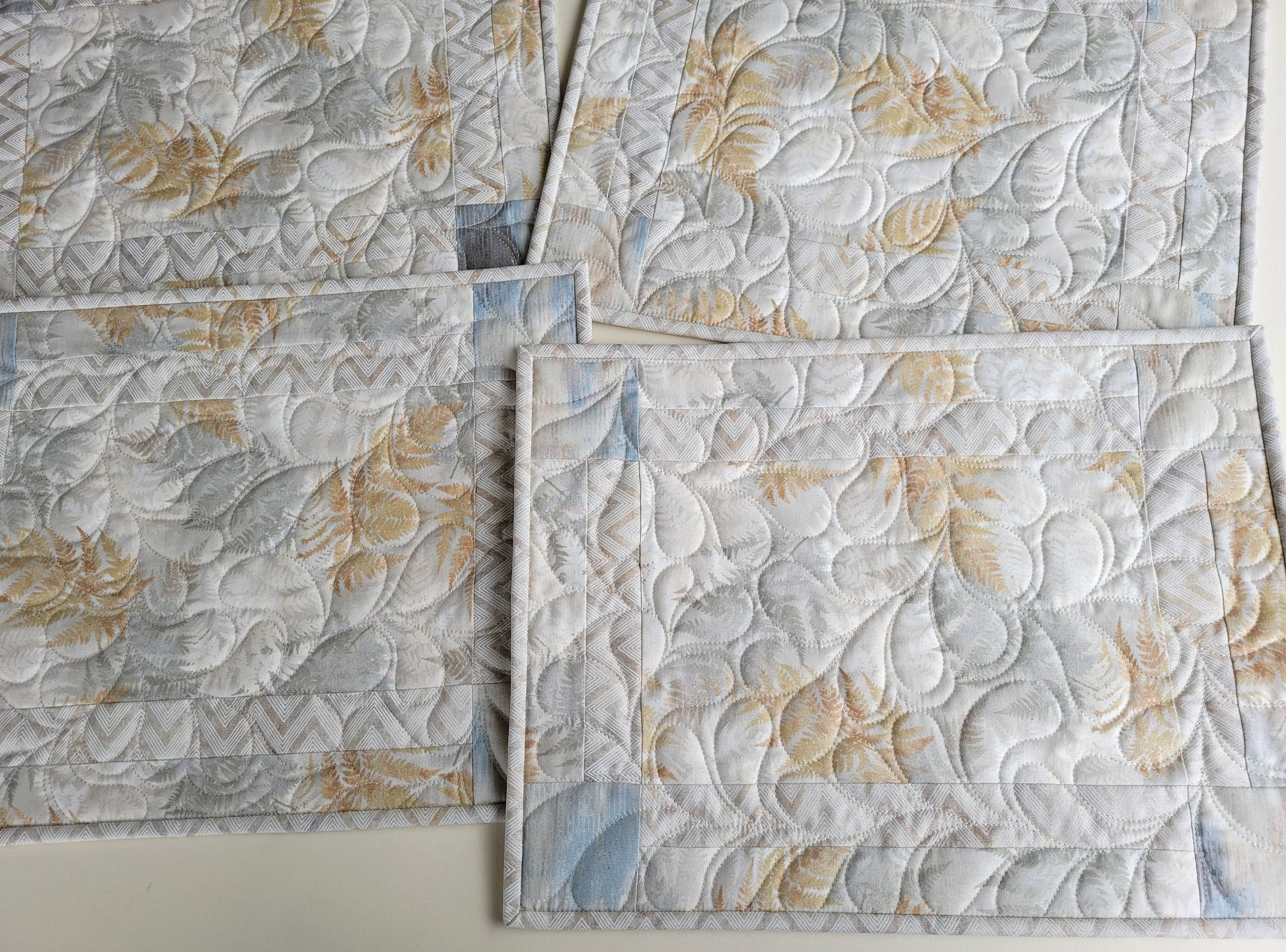 Neutral Quilted Placemats in Slate Blue, Beige and Gray with Modern Abstract Ferns