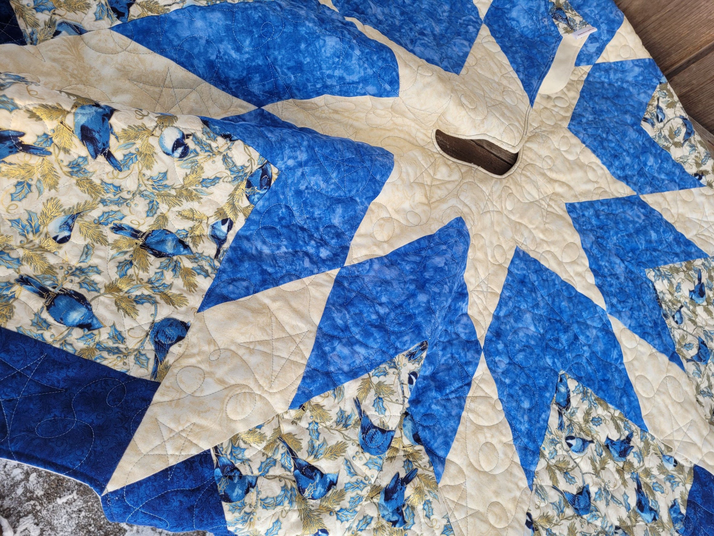 quilted tree skirt with blue birds