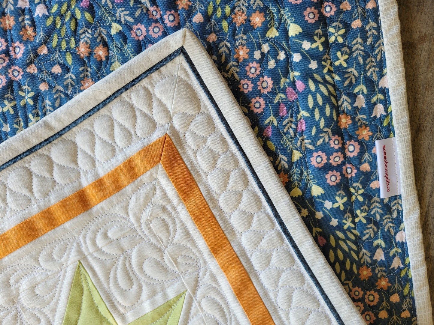 quilted table runner with floral backing