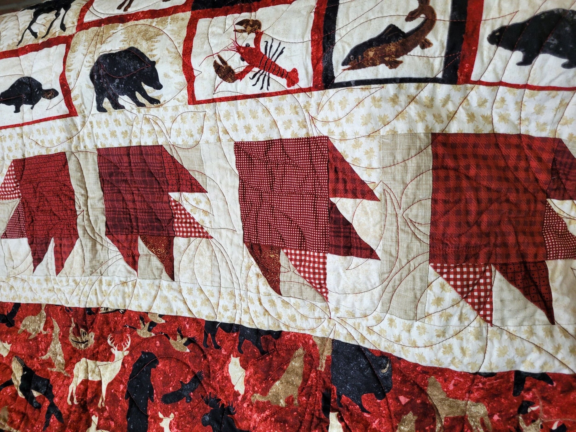 scrappy bear paw border on canada throw quilt