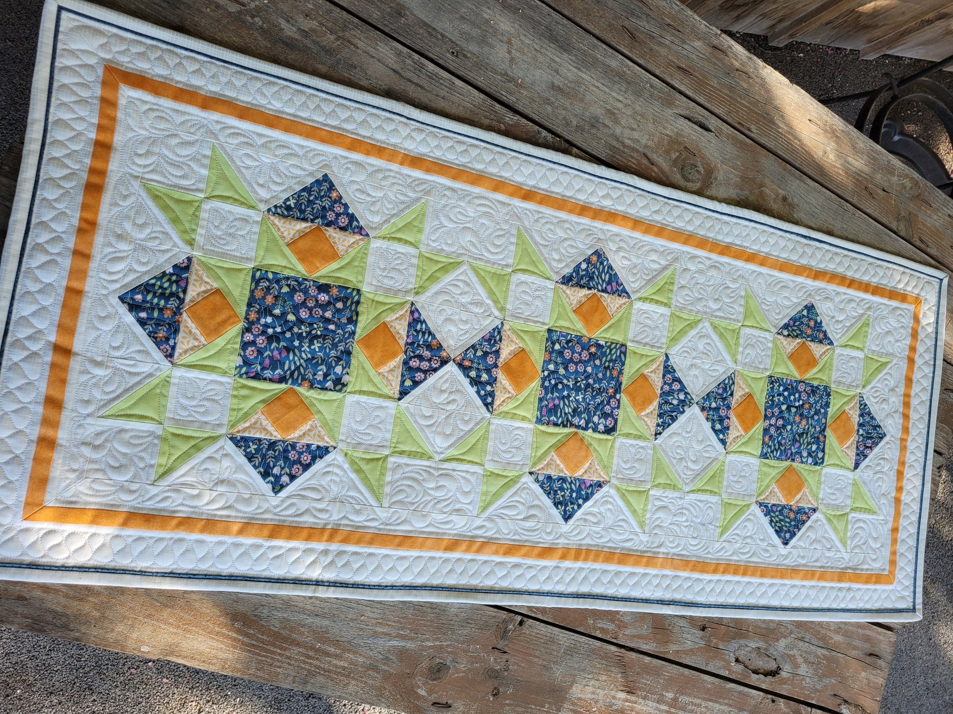 quilted table runner in white and blue
