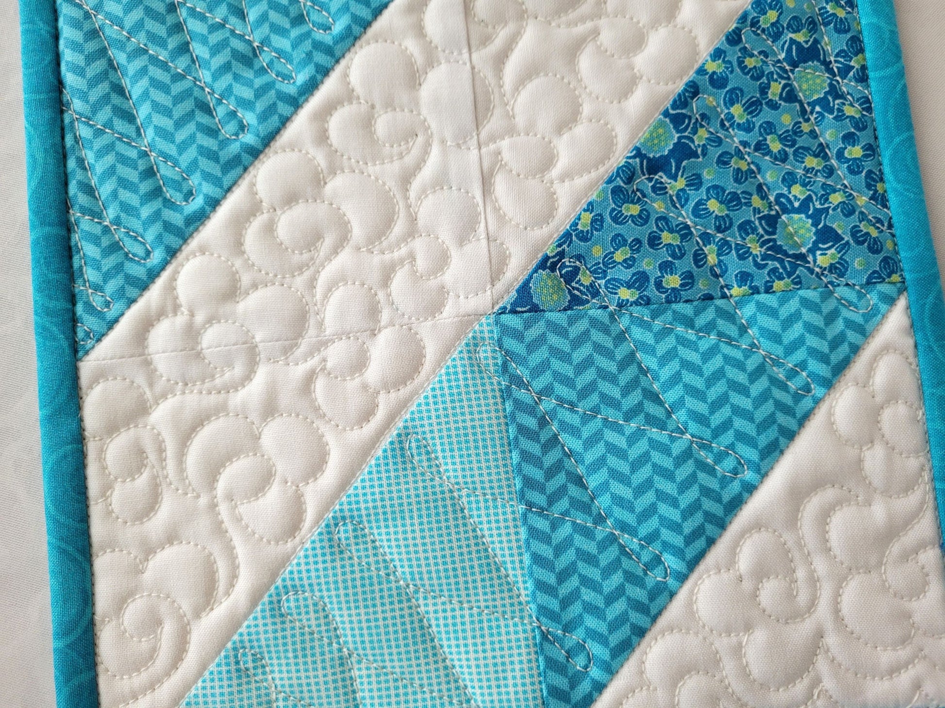 custom quilting on small scrap quilt